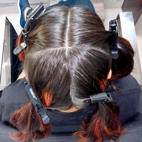 Divide your hair into sections before the trim